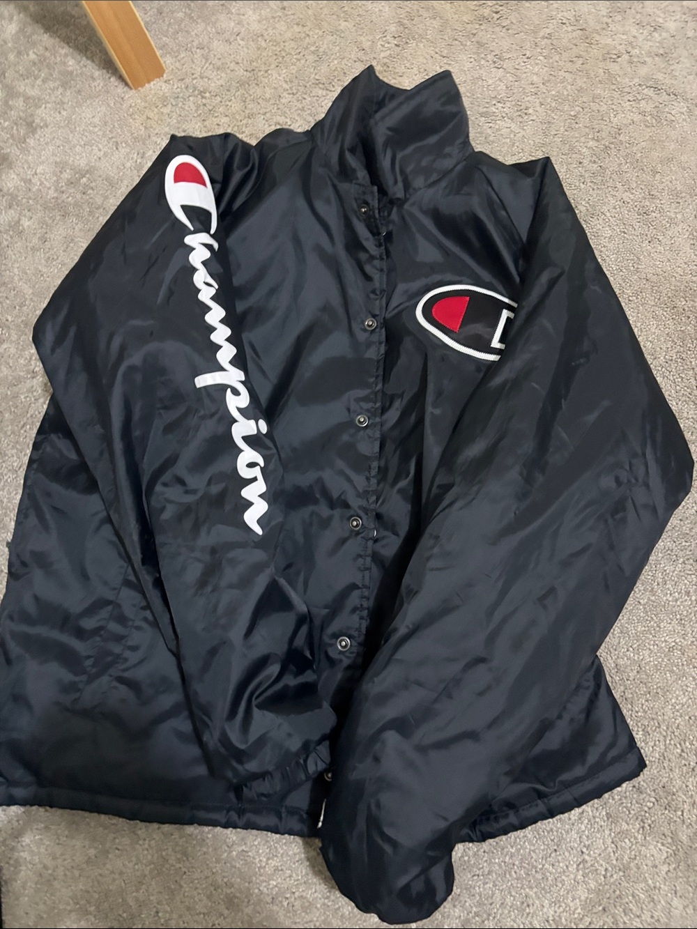 Champion Black Puffer Jacket with White Script and Red Logo Accents